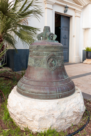 Capernaum (Cafarnaum), Israel - January 01, 2017 : The bell donated by parishioners in the courtyard of the Greek Orthodox monastery of the twelve apostles in Capernaum (Cafarnaum).のeditorial素材