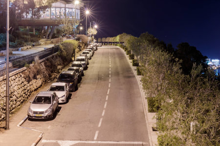 Quiet street and promenade at night in Haifa, Israelの写真素材