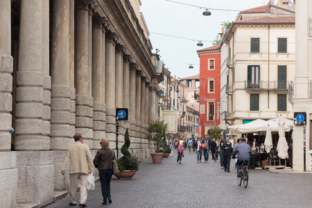 Verona, Italy - September 26, 2015 : Rome str and Castelvecchio watchtower with the clock. View from Piazza Bra in Verona, Italyのeditorial素材