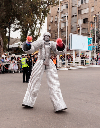 Nahariyya, Israel, March 10, 2017: Participants at the traditional annual Ñarnival parade "Adloyada" dressed in robots are walking along the street in Nahariyya, Israelのeditorial素材