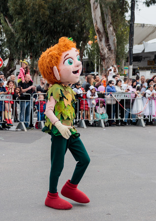 Nahariyya, Israel, March 10, 2017 : Participant in the traditional annual carnival parade "Adloyada" dressed in the suit of Peter Pan goes near the viewers and gives them a hand in Nahariyya, Israelのeditorial素材