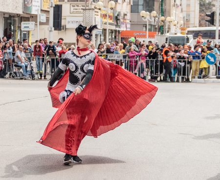 Nahariyya, Israel, March 10, 2017 : Participant at the traditional annual carnival parade "Adloyada" dressed in special costumes is walking along the street in Nahariyya, Israelのeditorial素材
