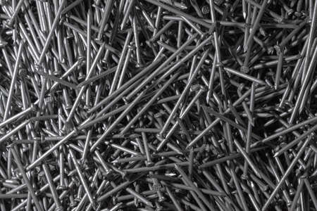 Metal Nails Texture. Many new long iron nails. Background for wallpaper.