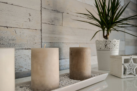 Home decoration with candles (sand color)の写真素材