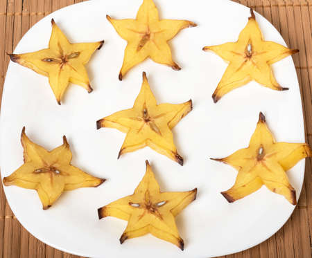 Carambola on white background - slices