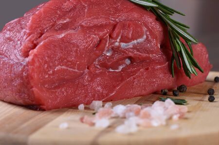 Fresh meat on a cutting boardの写真素材