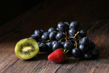 Berries are on a wooden tableの写真素材