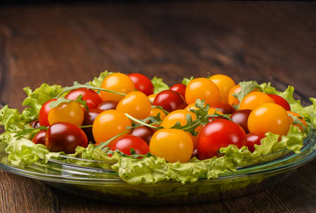 Cherry tomatoes, arugula and lettuceの写真素材