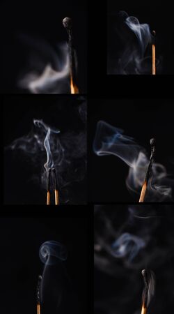 Smoke from extinguished matches on a black backgroundの写真素材