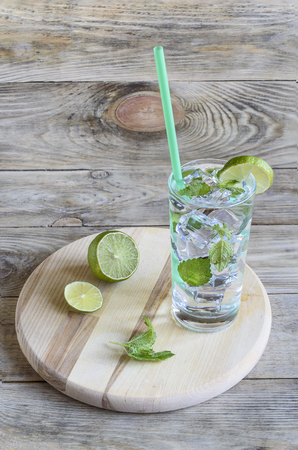 Cold water with vodka, melissa leaves and a slice of lime. Countの写真素材