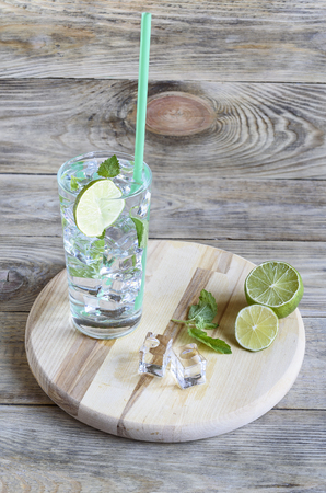 Refreshing drink with melissa leaves and a slice of limeの写真素材