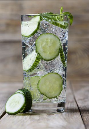 Cold fresh lemonade with cucumber and iceの写真素材