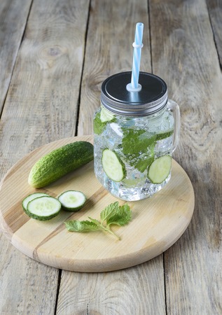 Cucumbers, nint and cold fresh lemonadeの写真素材