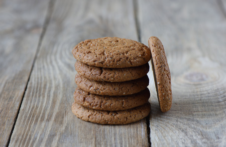 Oat biscuits on a old wooden backgroundの写真素材