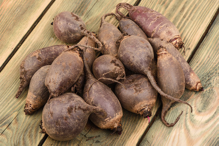 Beet on a wooden table. Rustic style.