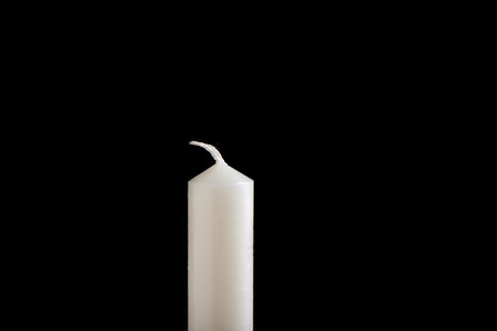 White unlit candle isolated on white background. Copy space.の写真素材