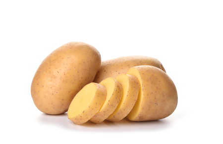 Potato cut slices isolated on white background. Copy space. Close upの写真素材