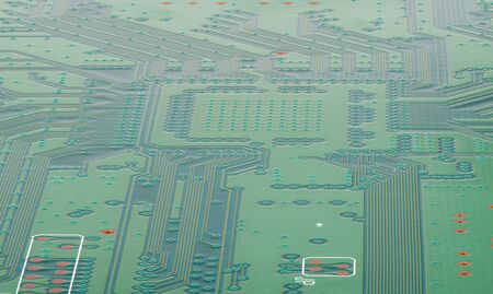 Circuit board with electronics on the back of the panel. Tracks on the board. The world of...
