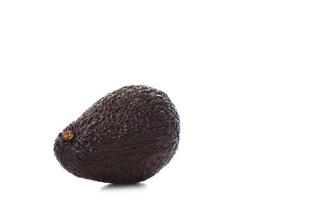 Haas Avocado fruit isolated over the white background. A diet of tropical fruits that contains a...