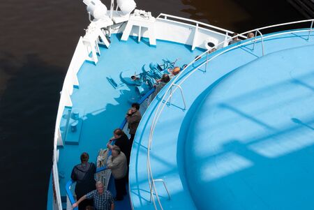Uglich, Yaroslavl Region, Russia, August 1, 2013. Cruise ship on the Volga. Cruise ship passes under the bridge.の写真素材
