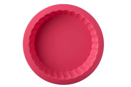 Red silicone baking dish isolated on a white background.の写真素材