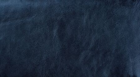 Dark blue leather texture background. Dark blue artificial leather background.の写真素材