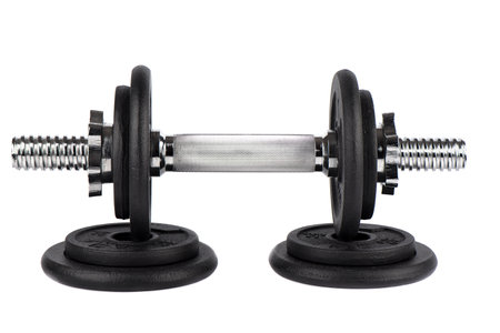 Dumbbell on disks isolated on white background. Close up. Copy space.の写真素材