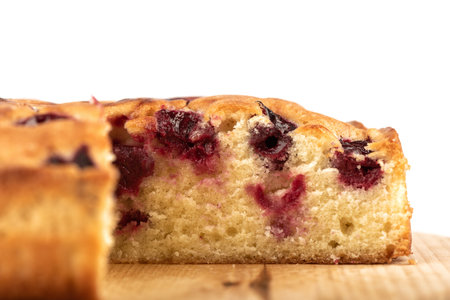 A macro shot of a slice of freshly baked cherry pie. Homemade cherry pie.
