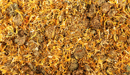 Full frame of Calendula officinalis or Marigold dry tea flowers. Food background concept.の写真素材