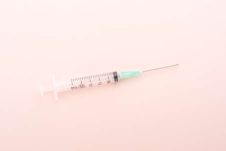Top view of a medical plastic syringe with a metal needle.の写真素材