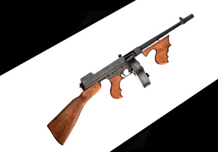 Thompson submachine gun with a fastened magazine of cartridges.