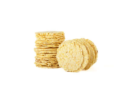 Thin fluffy cornbread isolated on white background. Healthy crunchy snack.の写真素材