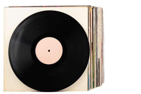 A stack of records on a white background, one in front.