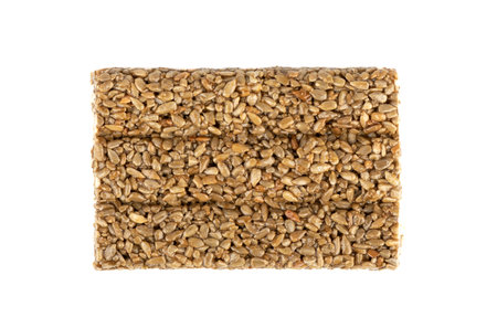 Top view of kozinaki tiles isolated on white background. Kozinaki is an oriental sweet made from peeled seeds mixed with molasses. copyspace.の写真素材