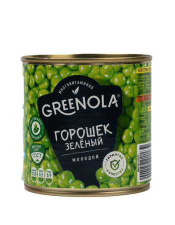 Moscow, Russia - September 6, 2022: Closed tin can with Greenola brand peas, produced by Belgorod cannery, Russia.のeditorial素材