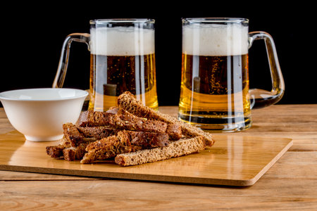 Garlic croutons made from toasted bread and sauce make a delicious beer snack. Copy space.の写真素材