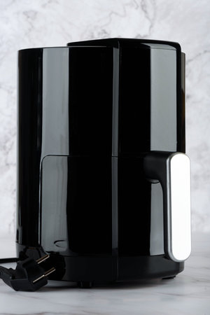 A close-up of the air grill on the kitchen table.の写真素材