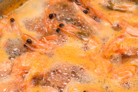 Shrimp in boiling water as a food background or texture.の写真素材