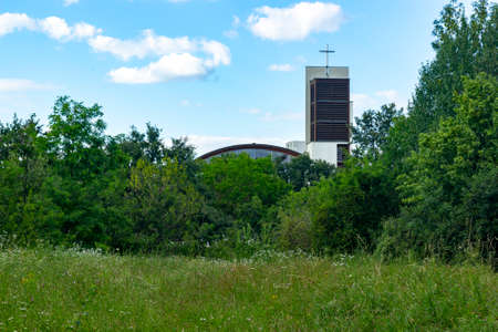 a church in the landscape in the summerの写真素材