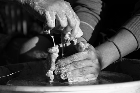 wet a clay potの写真素材