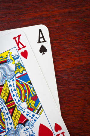 A king and an ace on wooden backgroundのeditorial素材