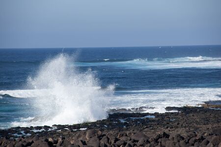 Surfers waiting for the right wave 