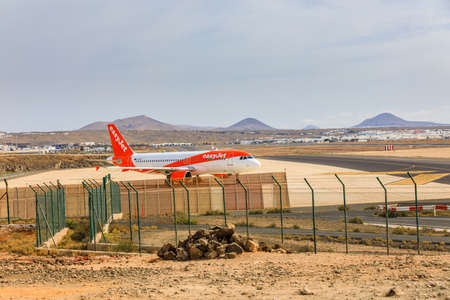 ARECIFE, SPAIN - APRIL, 15 2017: AirBus A319-100 of easyjet ready to take off at Lanzarote Airportのeditorial素材