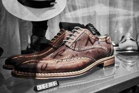 Shoes in the display of a shoe shopの写真素材