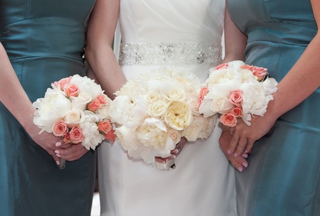 Wedding Bouquets in the Hands of Bridesmaidsの写真素材