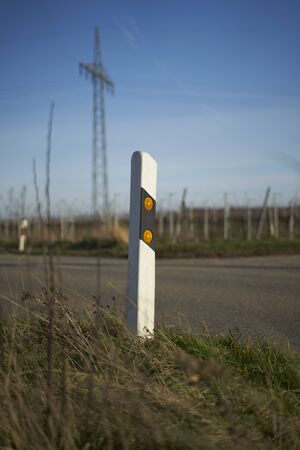 Guidepost on country road K9の写真素材