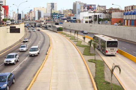 LIMA, PERU - FEBRUARY 13, 2012  Metropolitano bus stop at the crossing of the Avenues Ricardo Palma...