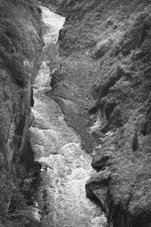 Monochrome image of the canyon of the Pastaza River photographed from the San Francisco Bridge in...