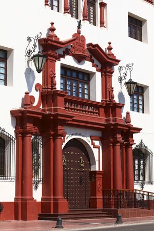 LA SERENA, CHILE - FEBRUARY 19, 2015: The entrance of the Tribunales de Justicia (Court of Justice) in the municipality building opening to  the street Los Carrera at the Plaza de Armas main square in the city center on February 19, 2015 in La Serena, Chiのeditorial素材