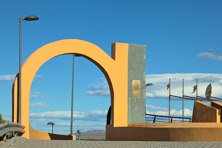 CHILE CHICO, CHILE - FEBRUARY 23, 2016: Arch at the Plaza del Viento (Square of the Wind) scenic viewpoint in Chile Chico, Chile on February 23, 2016. Chile Chico is a small town at the shore of Chile's biggest lake, the Lago General Carrera.のeditorial素材